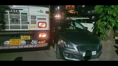 The truck, transporting milk from Sangrur, rammed into a car in Phase 3-A of Mohali. (HT Photo)