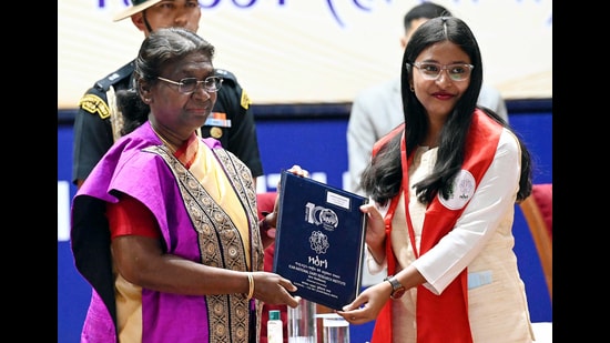 President Droupadi Murmu felicitates degree to the outgoing student at 19th convocation of ICAR–National Dairy Research Institute, in Karnal on Monday. She hailed women dairy farmers for their contribution in making the country self-reliant in milk production. (ANI)