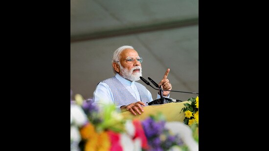 Prime Minister Narendra Modi speaks during the National Panchayati Raj Day celebrations in Rewa district on Monday. (PTI)