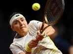 Tunisia's Ons Jabeur returns a ball