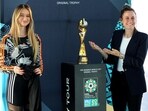 US player Heather O'Reilly and English freestyle competitor Lia Lewis reveal the FIFA Women’s World Cup trophy 