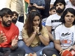 The wrestlers addressing a press conference during their protest against the Wrestling Federation of India in New Delhi. (Hindustan Times)