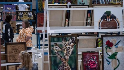 People view arts and crafts made by inmates and being sold by them during the Angola Prison Rodeo. (Brendan Smialowski / AFP) People view arts and crafts made by inmates and being sold by them during the Angola Prison Rodeo. (Brendan Smialowski / AFP)