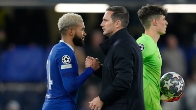 Chelsea's interim head coach Frank Lampard, centre, and Chelsea's Reece James shake hands after the Champions League quarterfinal second leg soccer match between Chelsea and Real Madrid at Stamford Bridge stadium in London, Tuesday, April 18, 2023. (AP Photo/Kirsty Wigglesworth) (AP) Chelsea's interim head coach Frank Lampard, centre, and Chelsea's Reece James shake hands after the Champions League quarterfinal second leg soccer match between Chelsea and Real Madrid at Stamford Bridge stadium in London, Tuesday, April 18, 2023. (AP Photo/Kirsty Wigglesworth) (AP)