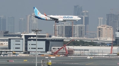 A Flydubai Boeing 737-800 airplane approaches for landing at Dubai Airport in Dubai, United Arab Emirates. Flydubai aircraft lands safely at Dubai Airport after catching fire (REUTERS/ Hamad I Mohammed/File Photo)