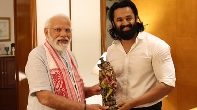 Unni Mukundan poses with Prime Minister Narendra Modi. Unni Mukundan poses with Prime Minister Narendra Modi.