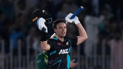 New Zealand's Mark Chapman celebrates after scoring century during the fifth Twenty20 cricket match between Pakistan and New Zealand, in Rawalpindi, Pakistan, Tuesday, April 25, 2023. (AP Photo/Anjum Naveed) (AP) New Zealand's Mark Chapman celebrates after scoring century during the fifth Twenty20 cricket match between Pakistan and New Zealand, in Rawalpindi, Pakistan, Tuesday, April 25, 2023. (AP Photo/Anjum Naveed) (AP)