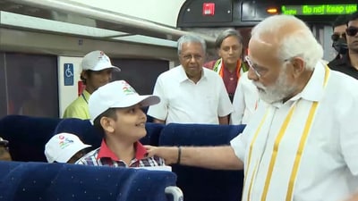PM Modi with school kids onboard Vande Bharat Express train. (Twitter/ ANI) PM Modi with school kids onboard Vande Bharat Express train. (Twitter/ ANI)