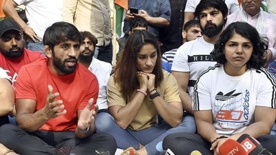 The wrestlers addressing a press conference during their protest against the Wrestling Federation of India in New Delhi. (Hindustan Times) The wrestlers addressing a press conference during their protest against the Wrestling Federation of India in New Delhi. (Hindustan Times)