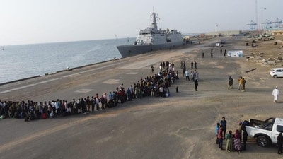 Hundreds of Indians form long queue in Port Sudan during massive evacuation effort by Indian Navy. (source: MEA) Hundreds of Indians form long queue in Port Sudan during massive evacuation effort by Indian Navy. (source: MEA)
