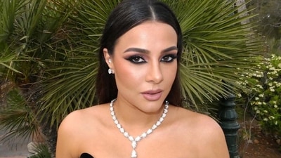 Tania also wore a statement diamond necklace for the wedding. Tania also wore a statement diamond necklace for the wedding. 