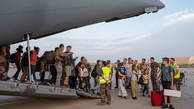 Japanese officials evacuate people from Sudan. (AFP)