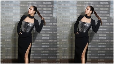 Malaika’s fashion diaries are getting better by the day. A few days back, the actor decked up in a bllack and silver gown and made her fans swoon.&nbsp; (Instagram/@malaikaaroraofficial)
