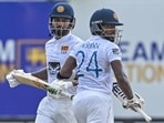 Sri Lanka's Dimuth Karunaratne (L) and Nishan Madushka run between the wickets during the second day of the second and final cricket Test match between Sri Lanka and Ireland at the Galle International Cricket Stadium in Galle on April 25, 2023. (Photo by Ishara S. KODIKARA / AFP) Sri Lanka's Dimuth Karunaratne (L) and Nishan Madushka run between the wickets during the second day of the second and final cricket Test match between Sri Lanka and Ireland at the Galle International Cricket Stadium in Galle on April 25, 2023. (Photo by Ishara S. KODIKARA / AFP)