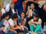 New Delhi: Wrestlers Vinesh Phogat (centre), Sangita Phogat (right), Sakshi Malik and others during their protest at Jantar Mantar, in New Delhi, Wednesday, April 26, 2023. (PTI Photo/Atul Yadav)(PTI04_26_2023_000163B) New Delhi: Wrestlers Vinesh Phogat (centre), Sangita Phogat (right), Sakshi Malik and others during their protest at Jantar Mantar, in New Delhi, Wednesday, April 26, 2023. (PTI Photo/Atul Yadav)(PTI04_26_2023_000163B)
