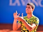 Spain's Carlos Alcaraz celebrates his victory over Greece's Stefanos Tsitsipas during the ATP Barcelona Open "Conde de Godo" tennis tournament singles final match at the Real Club de Tenis in Barcelona on April 23, 2023. (Photo by Pau BARRENA / AFP) Spain's Carlos Alcaraz celebrates his victory over Greece's Stefanos Tsitsipas during the ATP Barcelona Open "Conde de Godo" tennis tournament singles final match at the Real Club de Tenis in Barcelona on April 23, 2023. (Photo by Pau BARRENA / AFP)