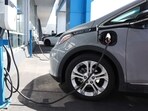 A Chevrolet Bolt EV sits parked at a charging station at Stewart Chevrolet on April 25, 2023 in Colma, California. A Chevrolet Bolt EV sits parked at a charging station at Stewart Chevrolet on April 25, 2023 in Colma, California.