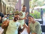 Anushka Sharma, Virat Kohli and Faf du Plessis posed together in an unseen picture. Anushka Sharma, Virat Kohli and Faf du Plessis posed together in an unseen picture.