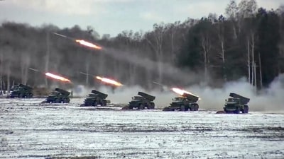 Multiple rocket launchers fire during Belarusian and Russian joint military drills at Brestsky firing range in Belarus. (AP) Multiple rocket launchers fire during Belarusian and Russian joint military drills at Brestsky firing range in Belarus. (AP)