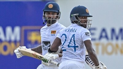 Sri Lanka's Dimuth Karunaratne (L) and Nishan Madushka run between the wickets during the second day of the second and final cricket Test match between Sri Lanka and Ireland at the Galle International Cricket Stadium in Galle on April 25, 2023. (Photo by Ishara S. KODIKARA / AFP) (AFP) Sri Lanka's Dimuth Karunaratne (L) and Nishan Madushka run between the wickets during the second day of the second and final cricket Test match between Sri Lanka and Ireland at the Galle International Cricket Stadium in Galle on April 25, 2023. (Photo by Ishara S. KODIKARA / AFP) (AFP)