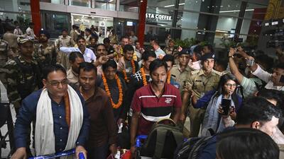 Indians evacuated from Sudan arrive on a flight at the Indira Gandhi International Airport on Wednesday. (AP) Indians evacuated from Sudan arrive on a flight at the Indira Gandhi International Airport on Wednesday. (AP)