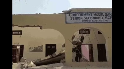 Irons bars in the roof collapsed while the work to raze Government Model Sanskriti Senior Secondary School at Rampur Sarsehri village in Ambala Cantonment was underway on Wednesday. (HT Photo)