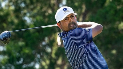 Anirban Lahiri, of Crushers GC, hits from the ninth tee during the final round of LIV Golf Adelaide at the Grange Golf Club, Sunday, April 23, 2023, in Adelaide, Australia. (Photo by Jason O'Brien/LIV Golf via AP) (AP) Anirban Lahiri, of Crushers GC, hits from the ninth tee during the final round of LIV Golf Adelaide at the Grange Golf Club, Sunday, April 23, 2023, in Adelaide, Australia. (Photo by Jason O'Brien/LIV Golf via AP) (AP)