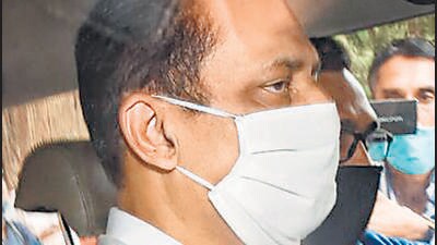 Mumbai: Mumbai Cop Sachin Vaze after being produced by National Investigation Agency (NIA) in a court following his arrest, in connection with a probe into the recovery of explosives from a car parked near industrialist Mukesh Ambani's house, in Mumbai, Sunday, March 14, 2021. (PTI Photo/Mitesh Bhuvad)(PTI03_14_2021_000098B) (PTI) Mumbai: Mumbai Cop Sachin Vaze after being produced by National Investigation Agency (NIA) in a court following his arrest, in connection with a probe into the recovery of explosives from a car parked near industrialist Mukesh Ambani's house, in Mumbai, Sunday, March 14, 2021. (PTI Photo/Mitesh Bhuvad)(PTI03_14_2021_000098B) (PTI)