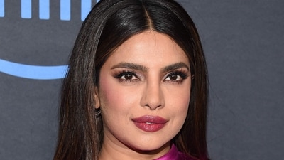 Priyanka looked glamorous in a pink dress at Citadel's LA premiere, and wore her hair straight. (AFP) Priyanka looked glamorous in a pink dress at Citadel's LA premiere, and wore her hair straight. (AFP)