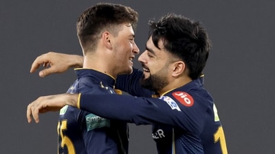 Gujarat Titans bowler Noor Ahmad with teammate Rashid Khan celebrate the wicket of Mumbai Indians batter Tim David during IPL 2023 (PTI) Gujarat Titans bowler Noor Ahmad with teammate Rashid Khan celebrate the wicket of Mumbai Indians batter Tim David during IPL 2023 (PTI)