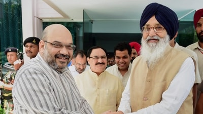 Parkash Singh Badal is seen with then BJP President Amit Shah in New Delhi. (PTI) Parkash Singh Badal is seen with then BJP President Amit Shah in New Delhi. (PTI)