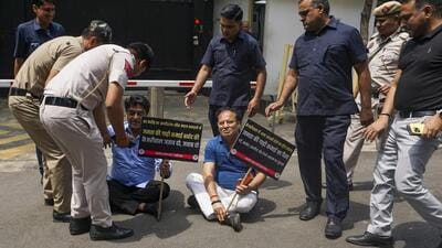 Police attempt to disperse Delhi BJP leaders during the latter's protest outside CM Arvind Kejriwal's official residence in New Delhi on Wednesday. (PTI) Police attempt to disperse Delhi BJP leaders during the latter's protest outside CM Arvind Kejriwal's official residence in New Delhi on Wednesday. (PTI)