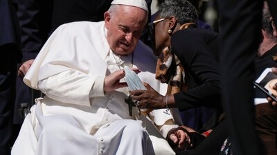 Pope Francis caresses a statuette of the Virgin Mary as he leaves at the end of his weekly general audience in St. Peter's Square, at the Vatican, Wednesday, April 26, 2023. (AP Photo/Alessandra Tarantino) (AP) Pope Francis caresses a statuette of the Virgin Mary as he leaves at the end of his weekly general audience in St. Peter's Square, at the Vatican, Wednesday, April 26, 2023. (AP Photo/Alessandra Tarantino) (AP)