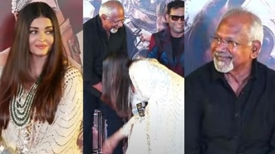Aishwarya Rai touches Mani Ratnam's feet on the stage at a promotional event for Ponniyin Selvan II. Aishwarya Rai touches Mani Ratnam's feet on the stage at a promotional event for Ponniyin Selvan II.