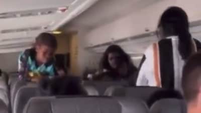 Screengrab from the footage of mid-air fights on a flight in Australia. (Twitter ) Screengrab from the footage of mid-air fights on a flight in Australia. (Twitter )