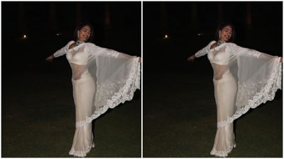 “Literally rolled on the grass like a sleepy puppy after we came back from the PS2 launch event,” read an excerpt of Sobhita’s caption. She further accessorised her look with statement emerald-stone studded earrings and a matching neck choker. (Instagram/@sobhitad) “Literally rolled on the grass like a sleepy puppy after we came back from the PS2 launch event,” read an excerpt of Sobhita’s caption. She further accessorised her look with statement emerald-stone studded earrings and a matching neck choker. (Instagram/@sobhitad)