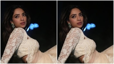 Sobhita looked ethereal in the chiffon saree with white lace borders. She further teamed it with a white matching blouse with quarter sleeves and a plunging sweetheart neckline. (Instagram/@sobhitad) Sobhita looked ethereal in the chiffon saree with white lace borders. She further teamed it with a white matching blouse with quarter sleeves and a plunging sweetheart neckline. (Instagram/@sobhitad)