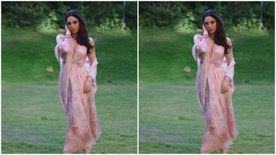 Sobhita's gown featured minimal floral patterns, a plunging neckline and a golden sequin detail at the waist. She teamed it with a matching dupatta. (Instagram/@sobhitad) Sobhita's gown featured minimal floral patterns, a plunging neckline and a golden sequin detail at the waist. She teamed it with a matching dupatta. (Instagram/@sobhitad)
