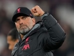 Liverpool's manager Jurgen Klopp celebrates towards his teams fans after the end of the English Premier League soccer match between West Ham United and Liverpool at the London stadium in London, Wednesday, April 26, 2023. Liverpool won the game 2-1. (AP Photo/Alastair Grant) Liverpool's manager Jurgen Klopp celebrates towards his teams fans after the end of the English Premier League soccer match between West Ham United and Liverpool at the London stadium in London, Wednesday, April 26, 2023. Liverpool won the game 2-1. (AP Photo/Alastair Grant)