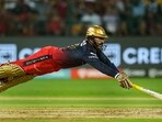 Dinesh Karthik dives to reach the crease. Dinesh Karthik dives to reach the crease.