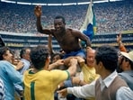 Brazil's Pele is hoisted on the shoulders of his teammates after Brazil won the World Cup final against Italy, 4-1, in Mexico City's Estadio Azteca