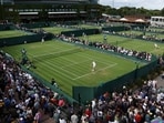 General view of the outside courts during play 