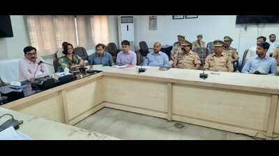 Aligarh district election officer Indra Vikram Singh presided during a meeting he held on April 27 to discuss civic polls in state. (HT photo)