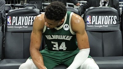 Giannis Antetokounmpo #34 of the Milwaukee Bucks sits on the bench after losing Game 5 of the Eastern Conference First Round Playoffs against the Miami Heat in overtime at Fiserv Forum. (Getty Images via AFP) Giannis Antetokounmpo #34 of the Milwaukee Bucks sits on the bench after losing Game 5 of the Eastern Conference First Round Playoffs against the Miami Heat in overtime at Fiserv Forum. (Getty Images via AFP)