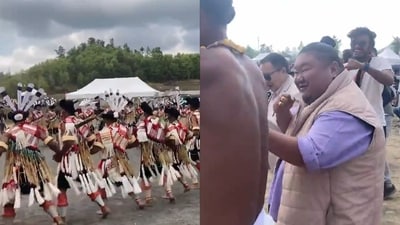 The image shows Temjen Imna Along grooving with the folk dancers at an event. (Twitter/@AlongImna) The image shows Temjen Imna Along grooving with the folk dancers at an event. (Twitter/@AlongImna)
