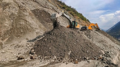 Maintenance and repair work on Jammu & Kashmir National Highway in the landslide-hit Ramban area. (PTI)
