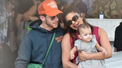 Priyanka Chopra, Nick Jonas with daughter Malti Marie Chopra Jonas at Mumbai airport. Priyanka Chopra, Nick Jonas with daughter Malti Marie Chopra Jonas at Mumbai airport.