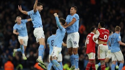 Manchester City's John Stones celebrates scoring their second goal with Ruben Dias and Rodri (REUTERS)
