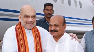 Union home minister Amit Shah with Karnataka chief minister Basavaraj Bommai in Bengaluru. (ANI) (HT_PRINT) Union home minister Amit Shah with Karnataka chief minister Basavaraj Bommai in Bengaluru. (ANI) (HT_PRINT)