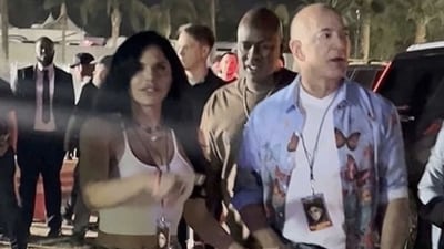 Jeff Bezos with his girlfriend Lauren Sanchez at Coachella. (Twitter/@pitdesi)